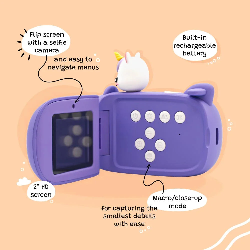 Back view of kiimento Model V unicorn kids digital camera showing flip-out screen, control buttons, and selfie camera. Features include 2-inch HD display, macro mode, and built-in rechargeable battery.