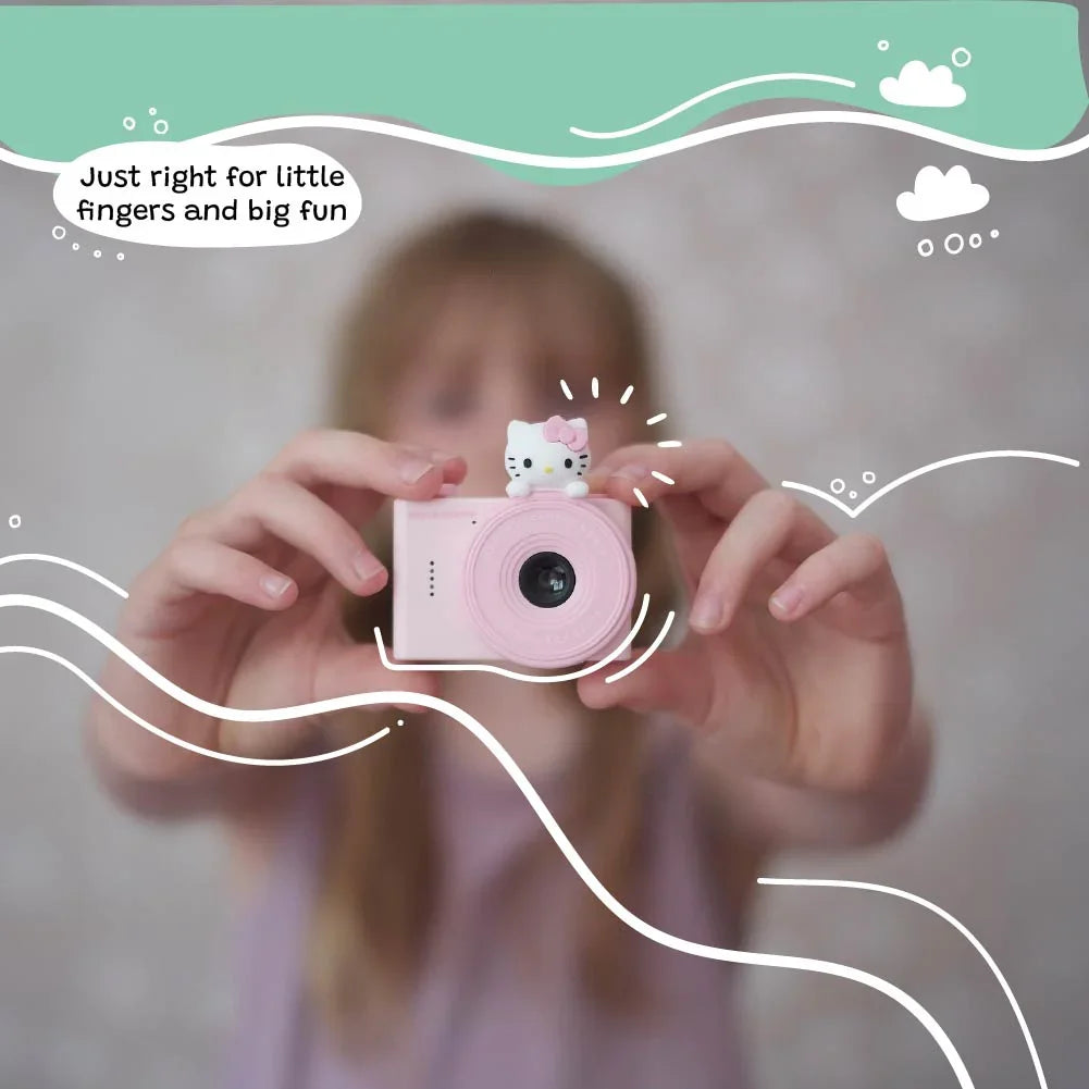 Hello Kitty Model A Kids Digital Camera - Child Holding the Camera, Perfect Size for Little Fingers and Big Fun.