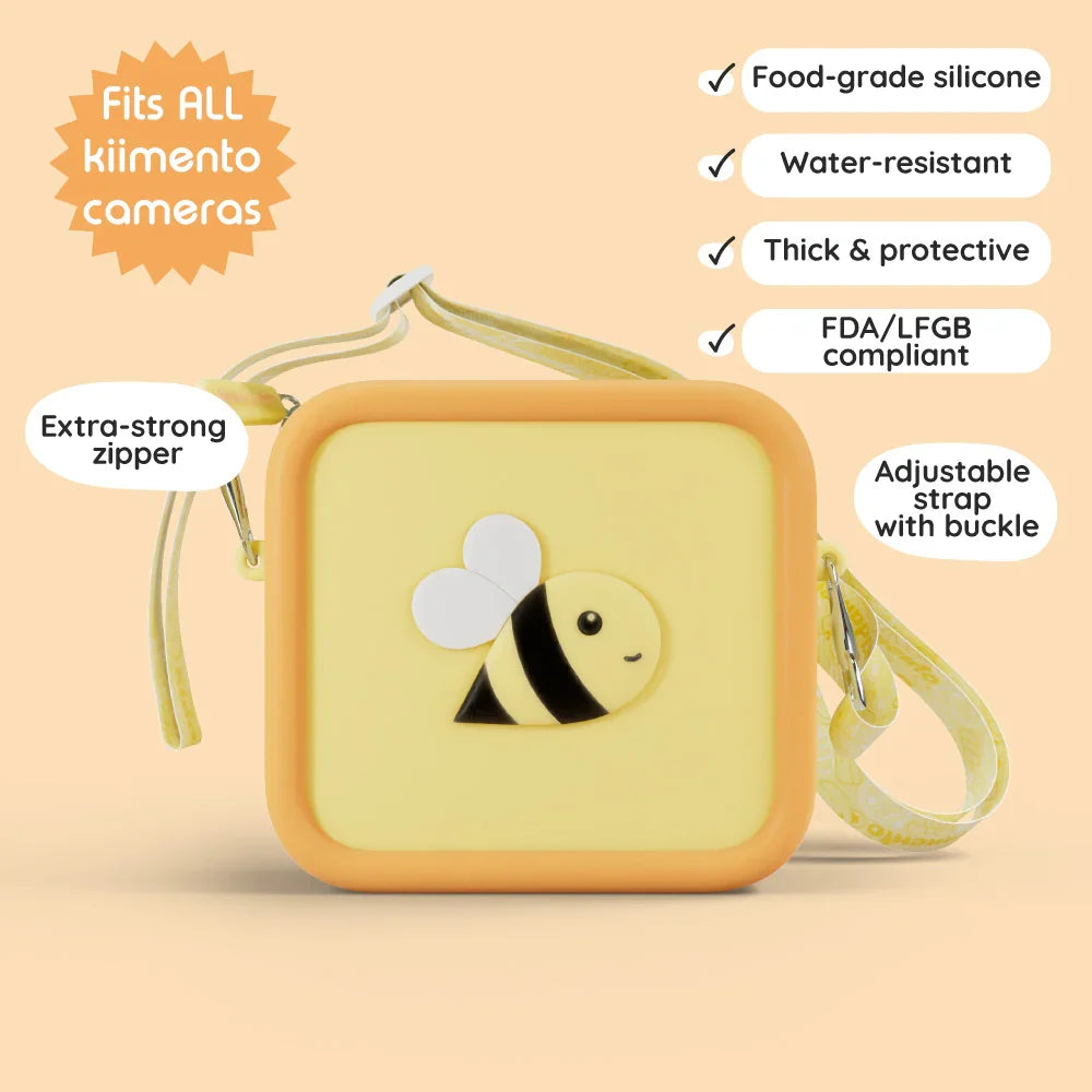 Yellow silicone bag with a bee design and adjustable strap.