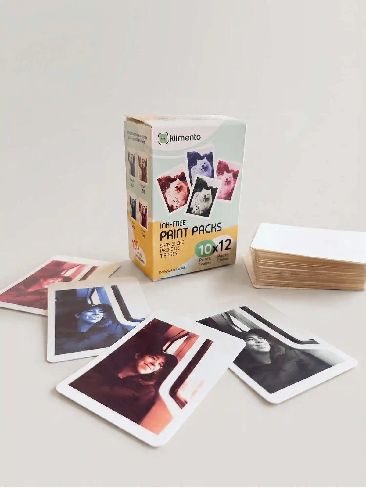 kiimento Ink-Free Print Pack 120 Prints shown with printed photo samples – for Model P2 instant print cameras