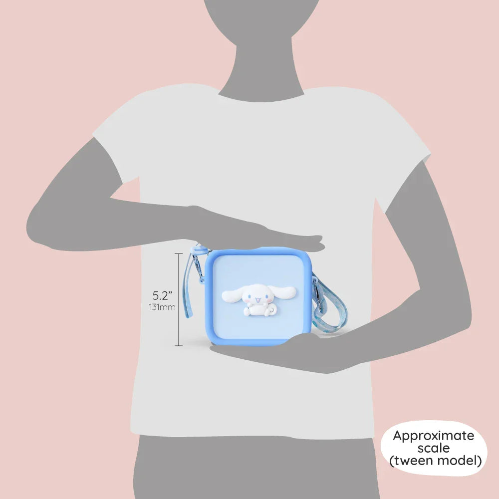 A light blue silicone Cinnamoroll bag with a 5.2-inch height shown for scale on a tween model.